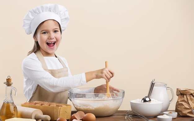 Photo happy little chef cooking