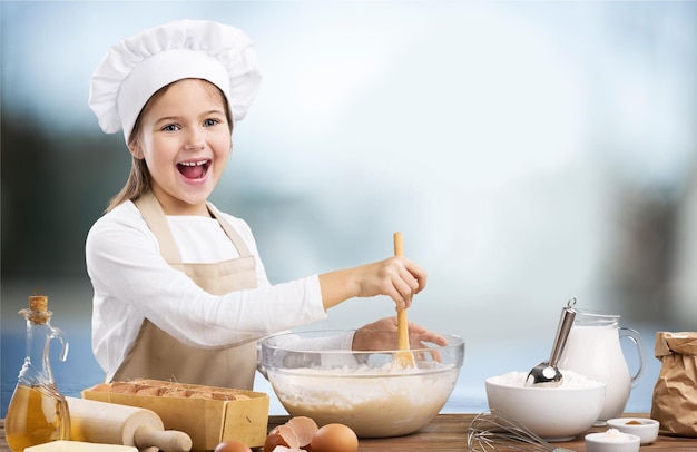 Happy little chef cooking