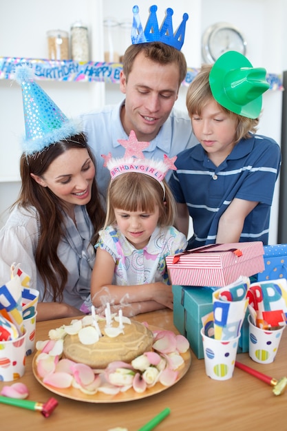 Happy little girl celebrating her birthday