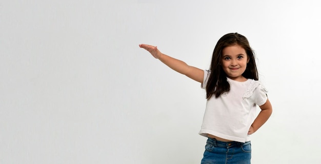 Happy little girl isolated on white background