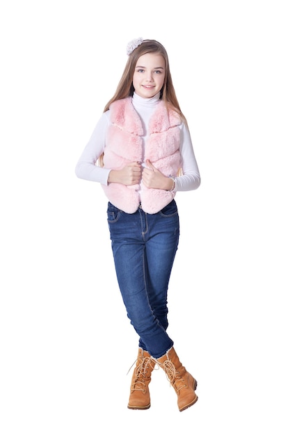 Happy little girl in jeans posing on white background