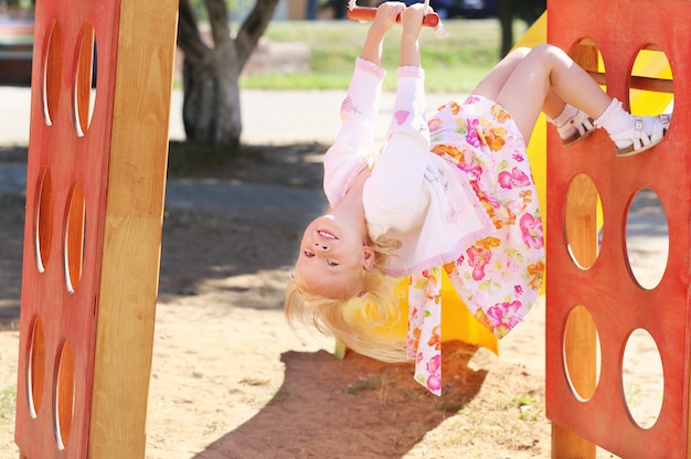 Happy little girl on playground