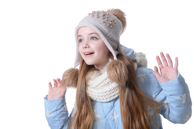 Happy little girl in warm clothes