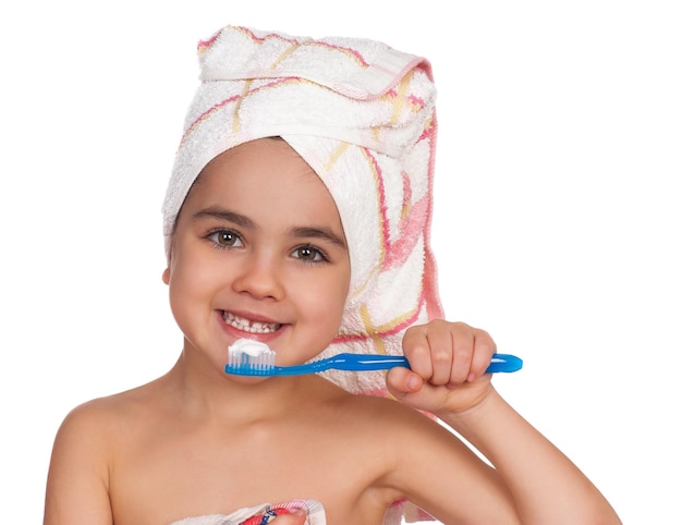 Happy little girl with toothbrush Isolated on white background