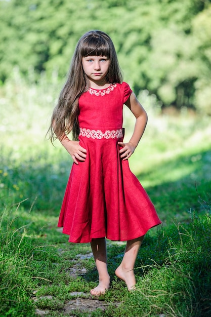 Happy little Ukrainian girl in the national costume.