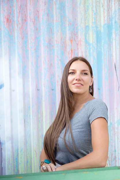 Happy long hair woman spending time on street