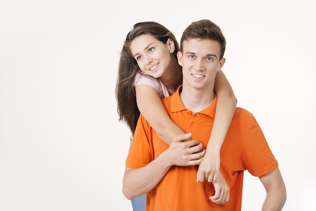 Happy lovely couple hugging and smiling 