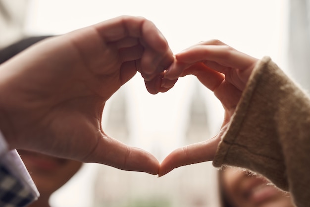 Happy lovers together forever heart hands shape.