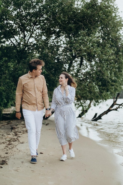 Happy loving couple on a sea shore