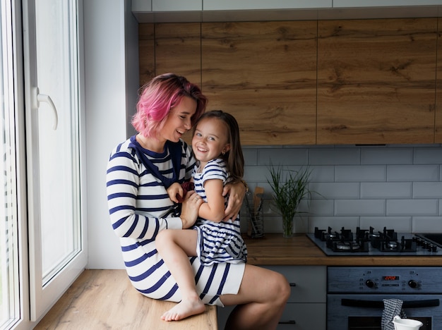 Happy loving family is preparing a bakery together