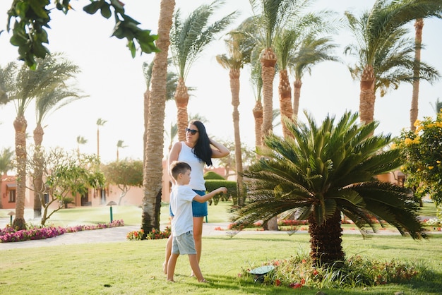 Happy loving mother and son playing and hugging. 