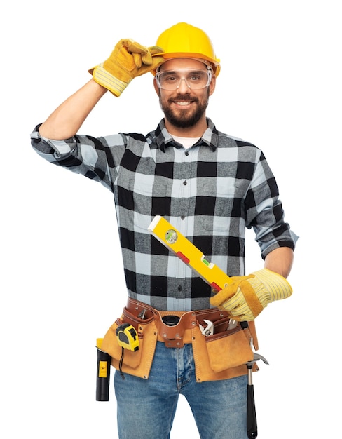 happy male worker or builder in helmet with level