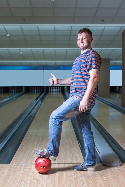 Happy man in bowling