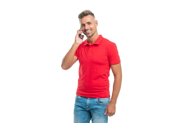 Happy man in casual shirt speak on phone isolated on white background