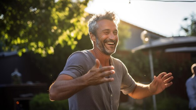 Photo happy man dancing at an outdoor party in the courtyard