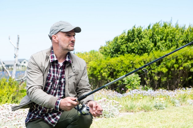 Happy man fishing 