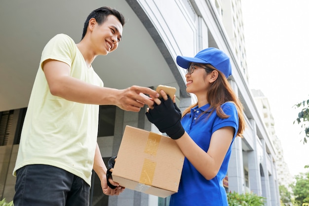 Happy man receiving package