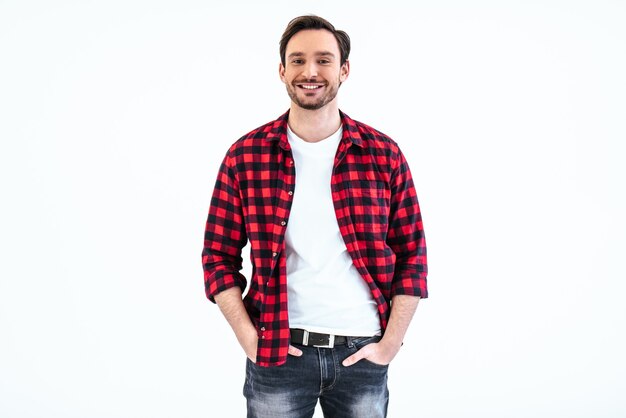 The happy man standing on the white background