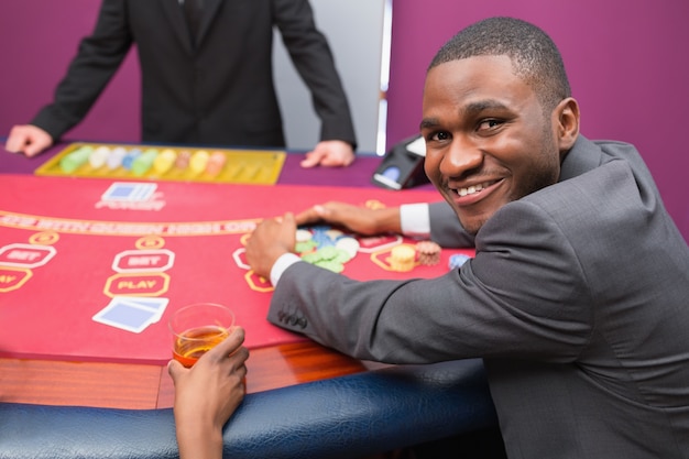 Happy man taking his winnings