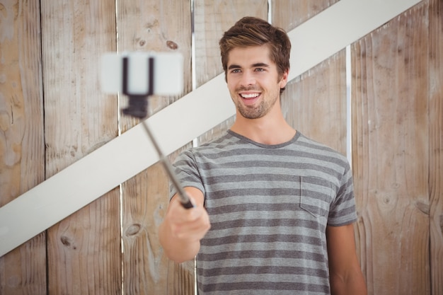 Happy man taking selfie