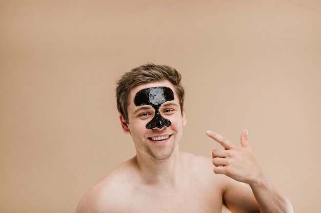 Happy man wearing a nose mask