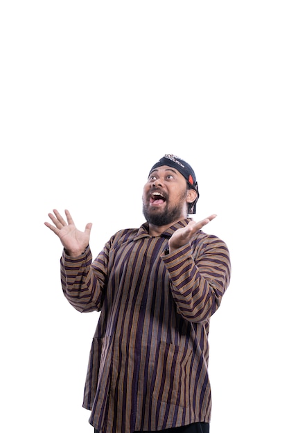 Happy man with javanese traditional lurik shirt