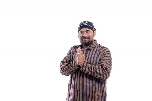 Happy man with Javanese traditional lurik shirt