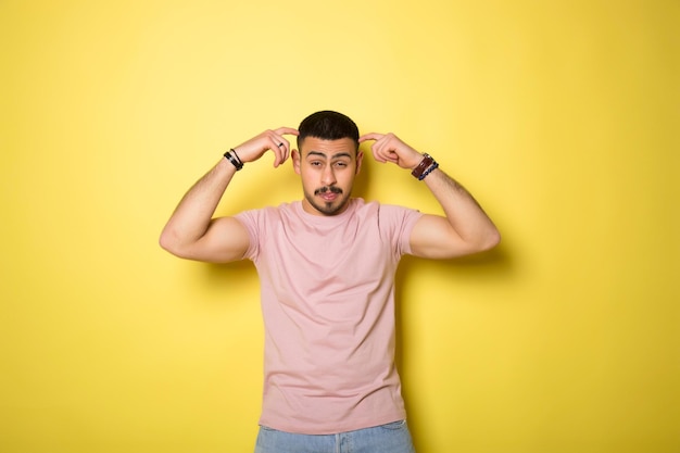 Happy man on yellow