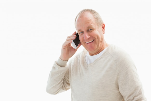 Happy mature man on the phone