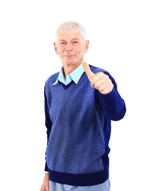 Happy mature man showing a thumbs up on white.