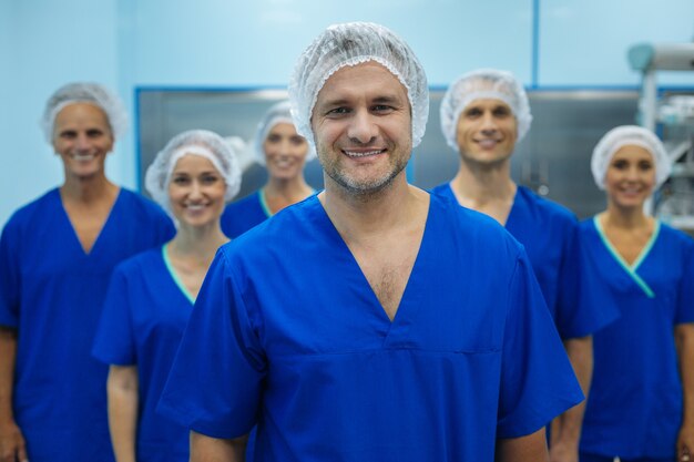 Happy medical team in their uniforms