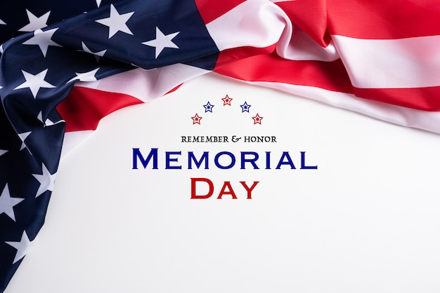 Happy Memorial Day. American flags with the text REMEMBER & HONOR background