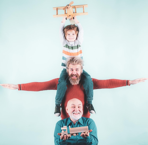 Happy men family traveling Family grandfather father and son dream about travel Summer holiday and v