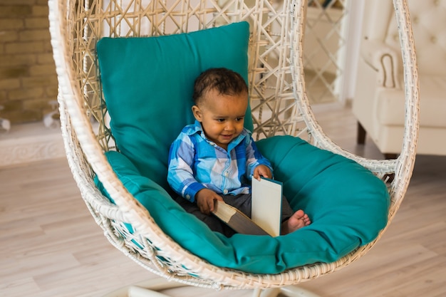 Happy Mixed Race Toddler Baby Boy indoors