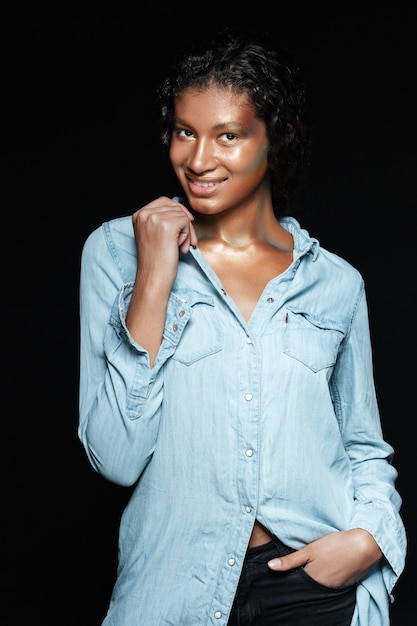 Happy model in shirt in studio.