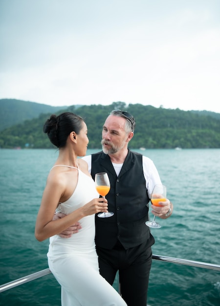 Happy moments of interracial couples on a yacht The couple had their honeymoon at one of Asias