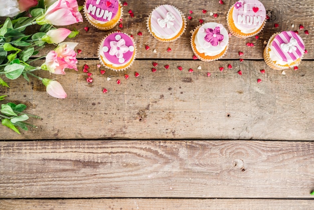 Happy moms day background with cupcakes