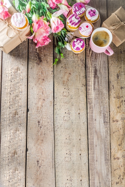 Happy moms day background with cupcakes