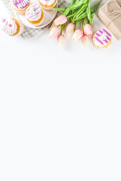 Happy moms day background with cupcakes