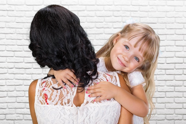 Happy mother and child girl