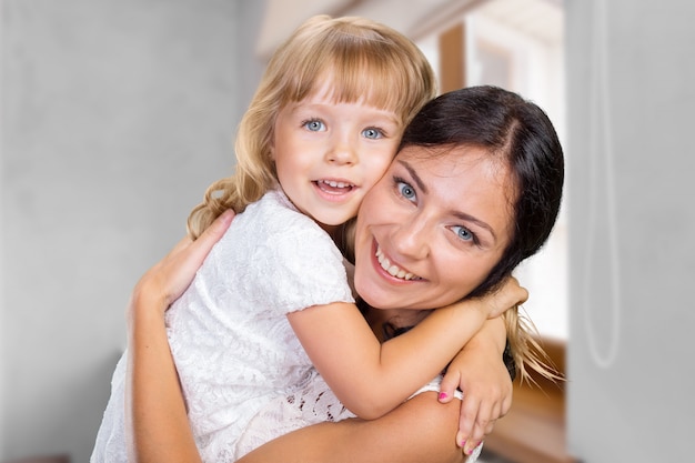 Happy mother and child girl