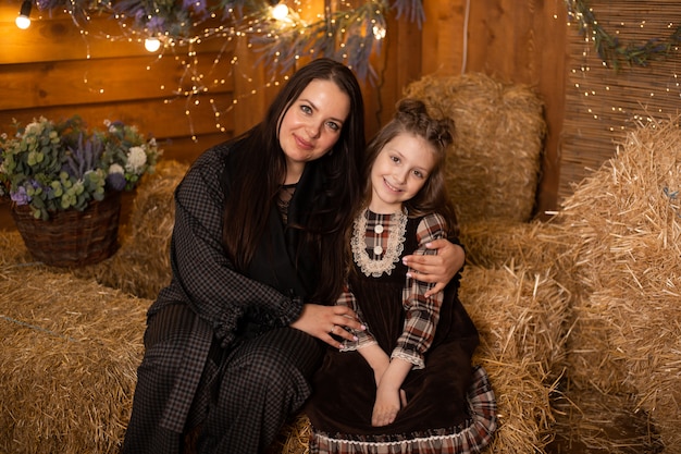 Happy mother and daughter in farm