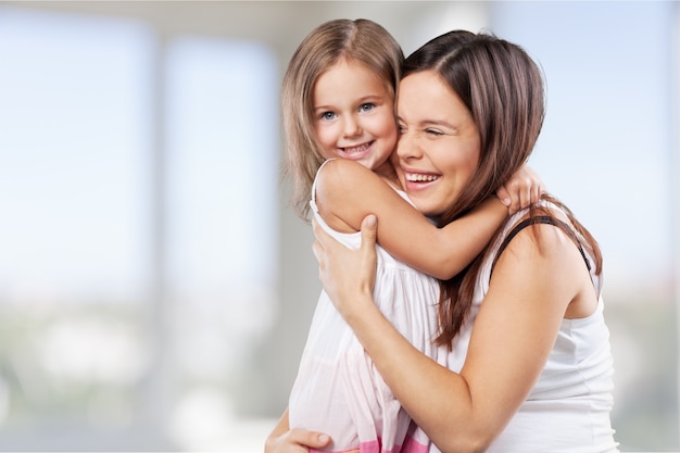 Happy Mother and daughter hugging