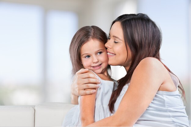 Happy Mother and daughter hugging