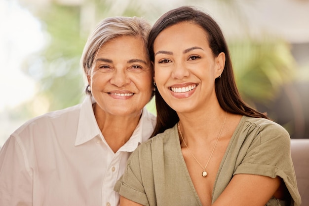 Happy mother and grandmother portrait smile for family bonding or mothers day relax at home Mama and grandma smiling together in generation relationship and relaxing in happiness at the house