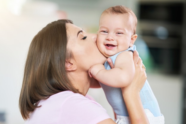 Happy Mother and her Newborn Baby