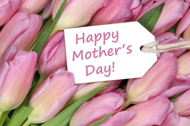 Happy mother's day on tag with tulips flowers