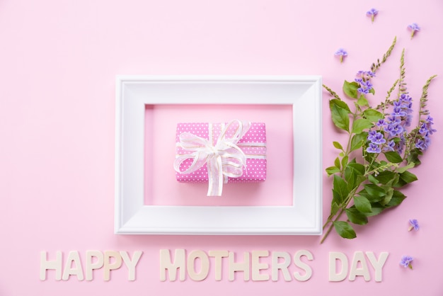 Happy mother's day with Top view of picture frame and gift box 