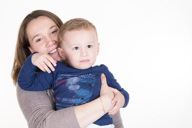 Happy mother talking to her son isolated