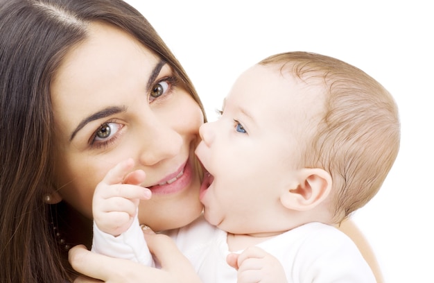 happy mother with baby over white